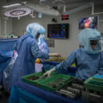 Dr Kilby and team in surgery